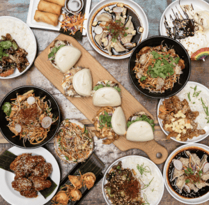 Table top view of Asian fusion food.