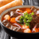 Authentic Vietnamese Beef Stew Bo Kho closeup in bowl