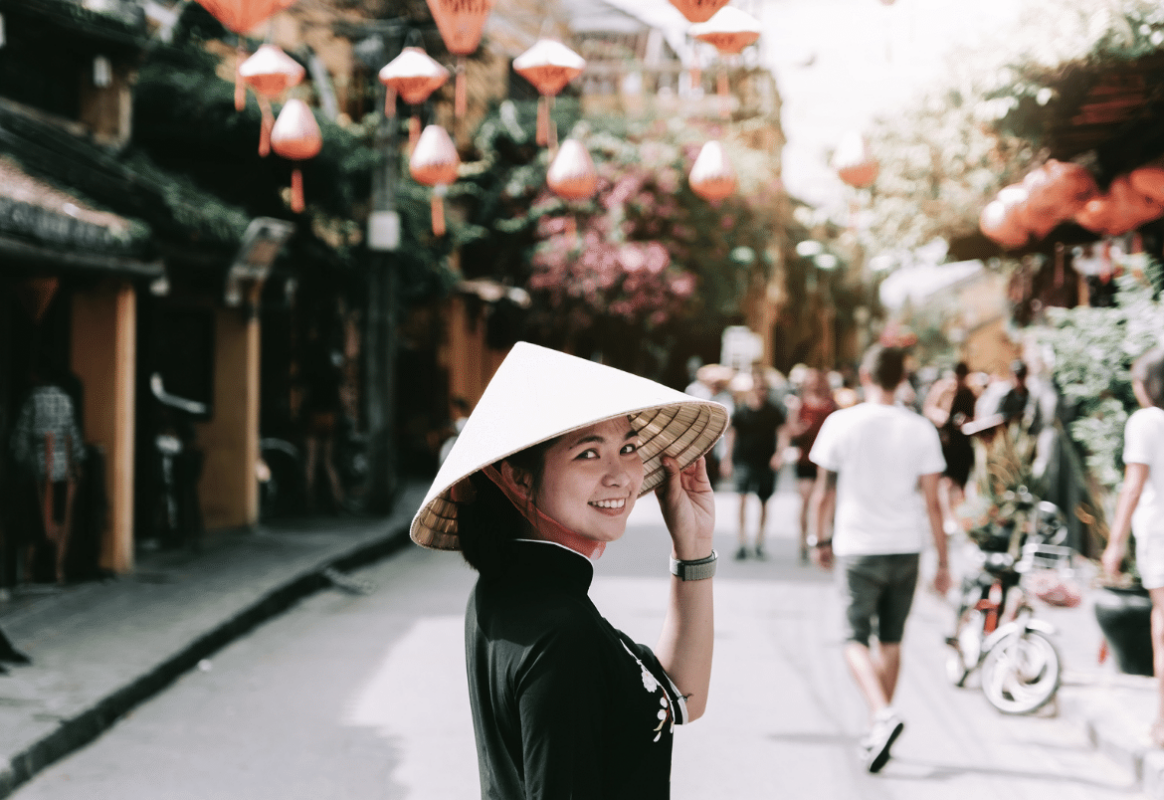 Vietnamese woman wearing hat at Vietnamese celebration